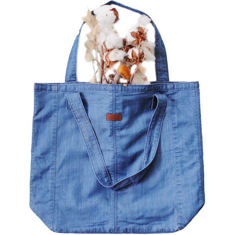 Photo of the blue Weekender Denim Tote Bag from the brand Porter Blue Apparel on EarthHero.